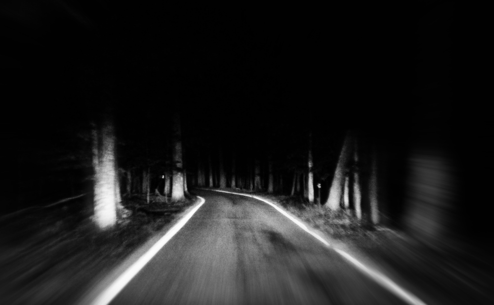 image of a dark unfrequented road true ghost story