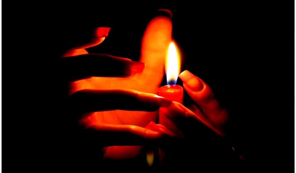 image of ghost hands around a candle indian ghost