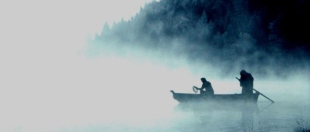 image of ferryman charon taking a man on river styx underworld mythology